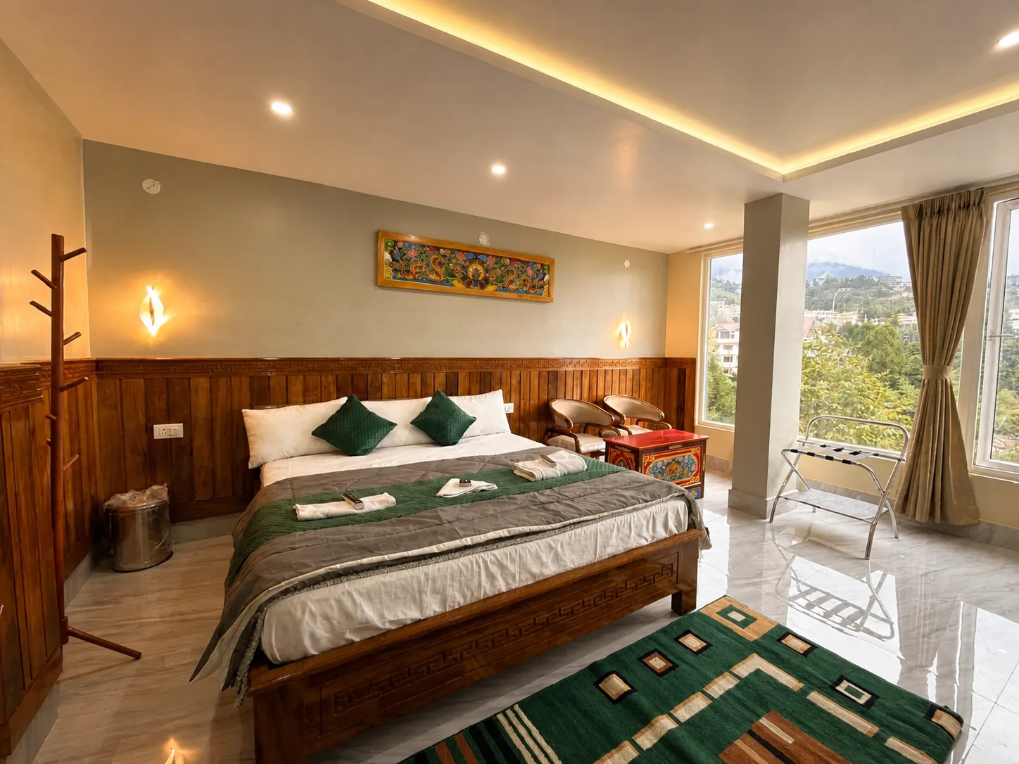 Presidential Suite at Rikya Retreat in Tawang with a double bed and large window view